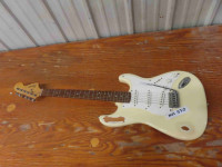 Squires Electric Guitar Model Stand by Fender