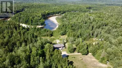 100 acres of privacy and natural beauty Over 1,000 ft of pristine waterfront on the Goulais River, a...