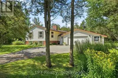 Set on 3.7 acres of peaceful woodland, this beautifully updated 2,700+ sq ft split-level home offers...