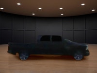 The 2022 Ram 1500 Classic SLT 4x4 Crew Cab in striking black is the perfect combination of power and... (image 4)