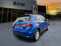 Meet the 2026 Mitsubishi RVR ES, a blue-front-wheel drive SUV that delivers confident handling and a... (image 4)