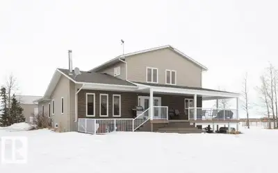 12.72-acre animal-ready acreage featuring a fully finished 2,186 sq ft two-story home with attached...