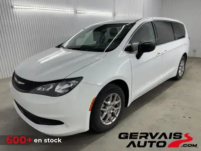 La Dodge Grand Caravan Stow 'n Go est une mini fourgonnette polyvalente conçue pour offrir une combi...