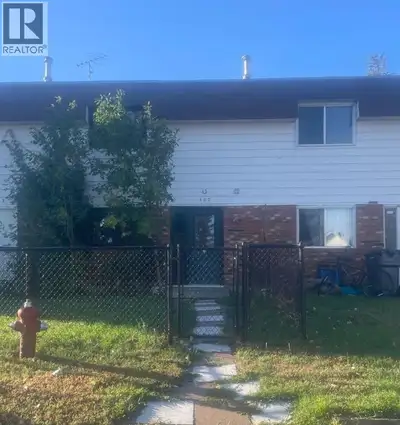 AFFORDABLE & EFFICIENT It's a 2 minute walk to the Bassano K-12 school from this sharp priced home....