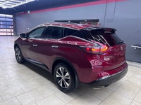 The 2021 Nissan Murano AWD SV in a striking Red finish promises confidence and capability with its a... (image 6)