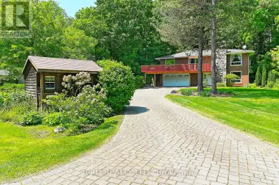 Come and view this charming custom home located in a private park-like oasis right in town! In fact...
