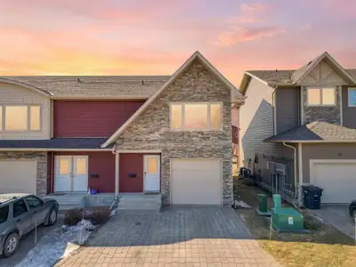 C15//Brandon/Welcome home to this spacious 1,890 sq ft two storey condo located in the desirable Lan...