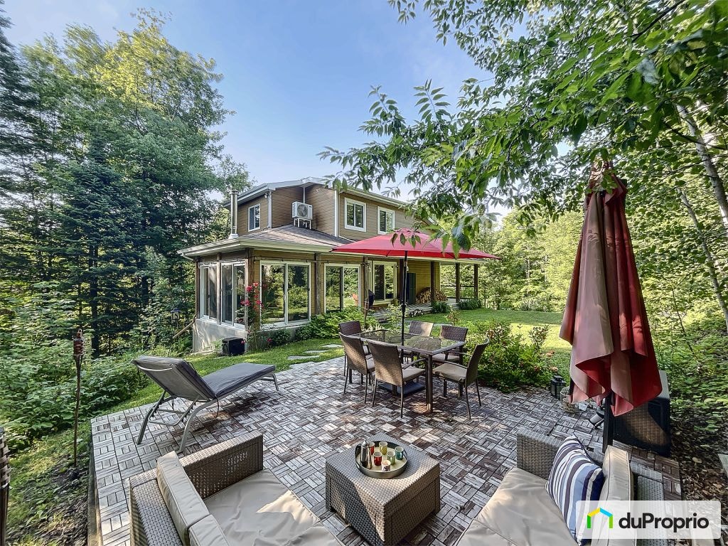 $889,000 - 2 Storey for sale in Ste-Anne-Des-Lacs — photo 1