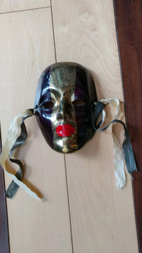 Small metal venetian mask