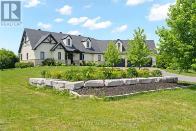 Nestled on a picturesque 2.3-acre estate lot, this exceptional 2020 bungalow is a showcase of timele...