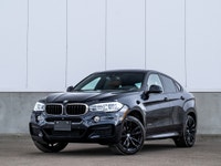 CARGET AUTOMOTIVE is thrilled to offer this 2019 BMW X6 xDrive35i, a luxury performance SUV coupe fe... (image 1)