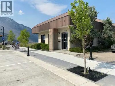 Located on 4 lots offering endless possibilities on newly developed main street in Bellevue! Interio...