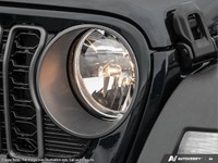 This Jeep Wrangler has a dependable Intercooled Turbo Premium Unleaded I-4 2.0 L/122 engine powering... (image 7)