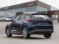 The excellent power delivery, superior handling and a swanky interior help propel this 2025 Mazda CX... (image 4)