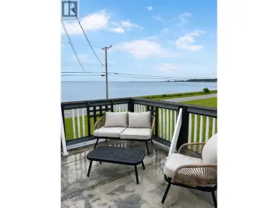 Breathtaking ocean views await from this spacious 6 -bedroom, 4.5 - bathroom home in beautiful Sands...