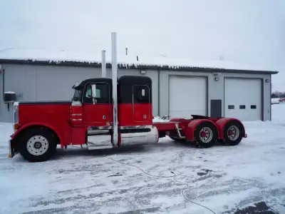 1998 Peterbilt 379, Cummins N-14 - 525 HP. 3;55 ratio, 260 inch W.B. 48 inch flat top, 12 / 38 axles...