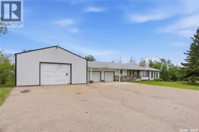 Escape to the peace and privacy of acreage living while enjoying the convenience of being just minut...