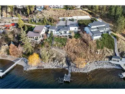 140' of Okanagan Lakefront living at its best. Dock+lakefront cabana+deck in a quiet sheltered cove...