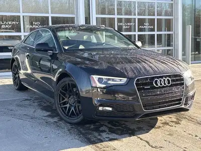 Stock Number: L0056CA AMVIC LICENSED DEALER This 2015 Audi A5 Coupe Technik is finished in Brilliant...