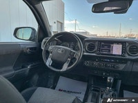Experience proven reliability and rugged capability with the *2021 Toyota Tacoma*, featuring *143,96... (image 9)