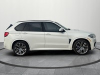 Experience the perfect blend of luxury and performance with this stunning 2018 BMW X5 M. Finished in... (image 6)