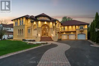 Prepare to be captivated by this truly one-of-a-kind, architecturally stunning residence an extraord...