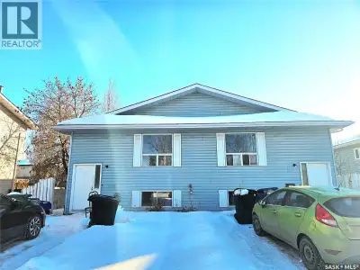 Discover an exceptional investment opportunity at 242-244 Wakabayashi Way, a bi-level duplex perfect...
