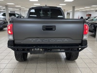 Among midsize pickups that talk tough but feel soft when the work gets real, this 2021 Toyota Tacoma... (image 4)