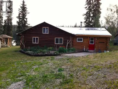 A remote, yet accessible jewel of the Cariboo. Truly unique, off-grid home; with 186 ft. of lakefron...