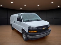 The 2020 Chevrolet Express Cargo Van 2500 Extended Wheelbase in a clean White finish, paired with re... (image 2)