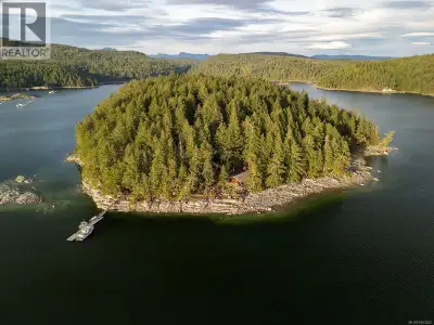 Escape to the rare serenity of Tan Island—a 40 acre private paradise tucked just off the pristine sh...