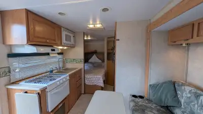 18ft light weight travel trailer, tandem axle, aluminum structure with fiberglass exterior walls. (2...