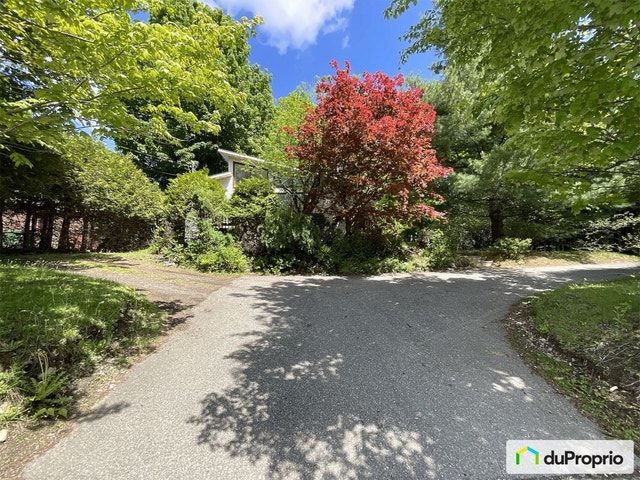 $450,000 - Bungalow for sale in Sherbrooke (Jacques-Cartier) — photo 1