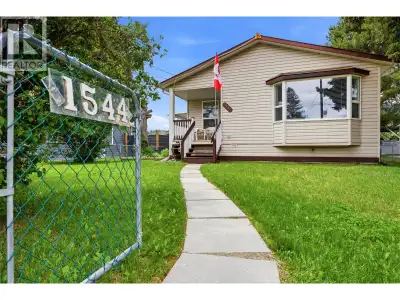 Tucked into an established neighbourhood with beautiful green space surroundings, this lovingly main...