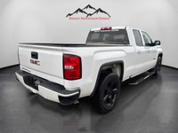 The 2019 GMC Sierra 1500 Limited 4WD Double Cab Standard Box in a striking white color is a robust t... (image 4)