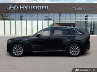 Command the road with confidence and elegance in the remarkable 2025 Mazda CX-90 MHEV GT. This black... (image 1)