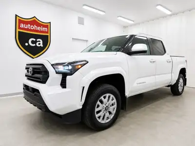 Voici votre prochain compagnon d'aventure ! Ce Toyota Tacoma blanc immaculé de 2025 n'est pas qu'un...
