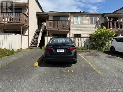 Well priced two bedroom one bathroom ground level entry condo in Woodgrove Gardens This unit has see...