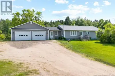 Don't miss this rare opportunity to own an updated bungalow on a stunning 3-acre lot in the peaceful...