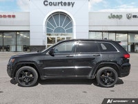 Designed for adventure and daily reliability, this 2015 Jeep Grand Cherokee Laredo is ready for what... (image 2)
