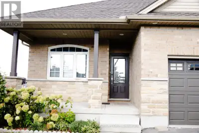 Beautiful all-brick walk-out bungalow on a quiet cul-de-sac with no rear neighbours! This well-maint...