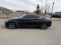 The 2017 Infiniti Q60 Premium is a luxurious 2-door coupe, often featuring a 300-horsepower 3.0L twi... (image 1)