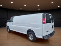 The 2020 Chevrolet Express Cargo Van 2500 Extended Wheelbase in a clean White finish, paired with re... (image 7)