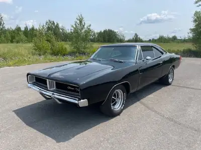 Dodge Charger R/T 1969 Offrez-vous une véritable icône de l'ère muscle car avec cette sublime Dodge...