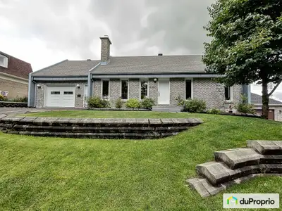 Offre conditionnelle acceptée- Maison chaleureuse avec terrain intime et garage excavé Charmante mai...