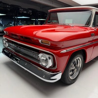 Check out this beautifully restored 1965 Chevrolet C10 Deluxe pickup finished in Cardinal red and Er... (image 6)