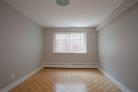 Semi-renovated Akelius two bedroom apartment for rent. Located near Drummond and Sherbrooke in the D... (image 5)
