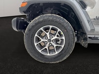 This 2026 JEEP GLADIATOR SPORT 4X4 has the following options Cloth Low-Back Bucket Seats, Remote Sta... (image 8)
