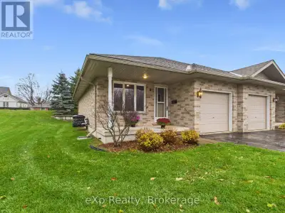 Enjoy easy living in this immaculate end-unit condo, nestled in a friendly retirement community. Use...