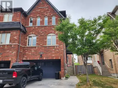 Westmount End Unit Townhome With 2 Car Garage And Double Driveway. 3 Bedroom Townhome With 2 Full Ba...